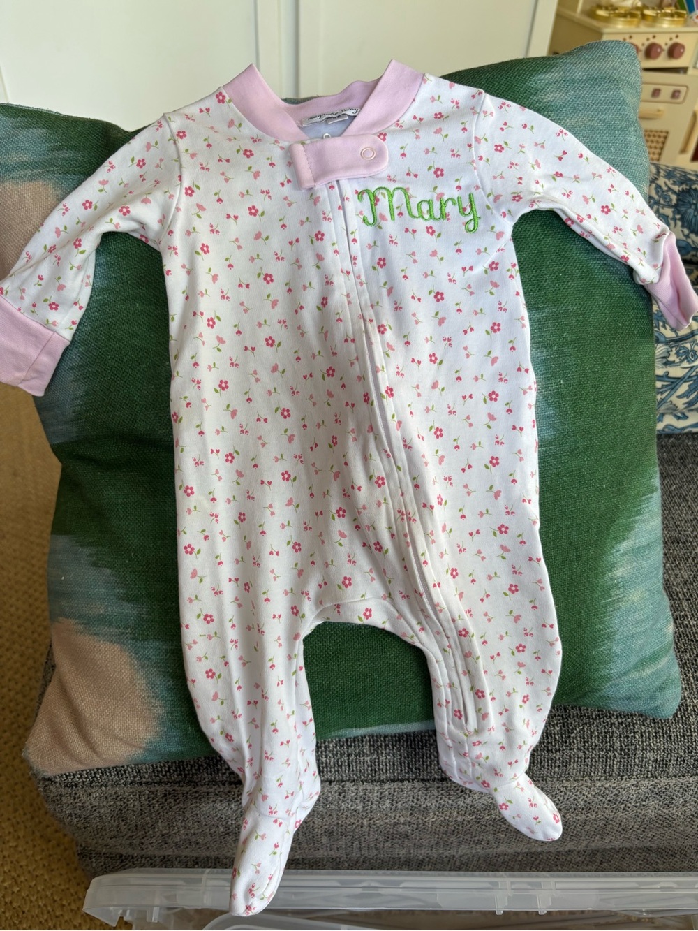 Magnolia Baby newborn floral footie, embroidered with “Mary”